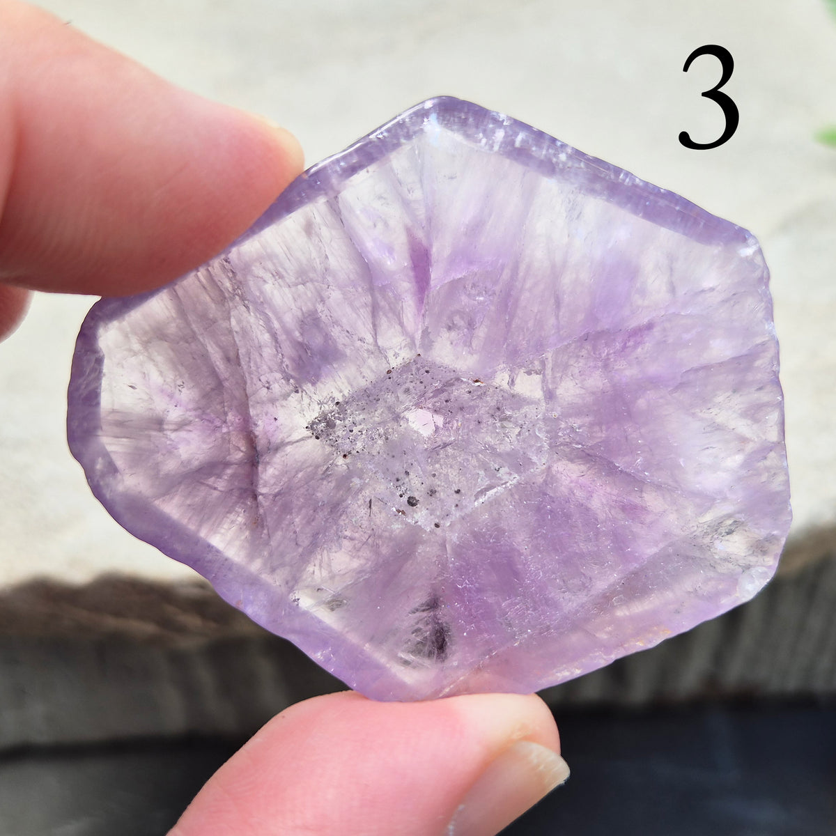 One-of-a-kind Vortex Amethyst slice with a natural trapiche-like radial pattern. Polished amethyst with unique internal colour zoning. 