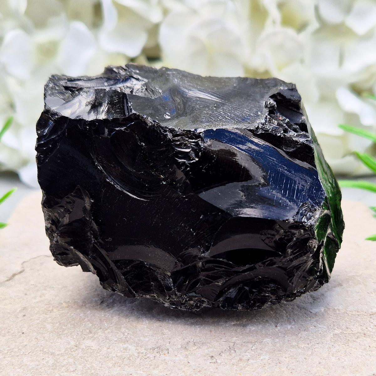 Natural black obsidian freeform from Mexico, known for its grounding presence and protective energy. A striking volcanic glass piece.