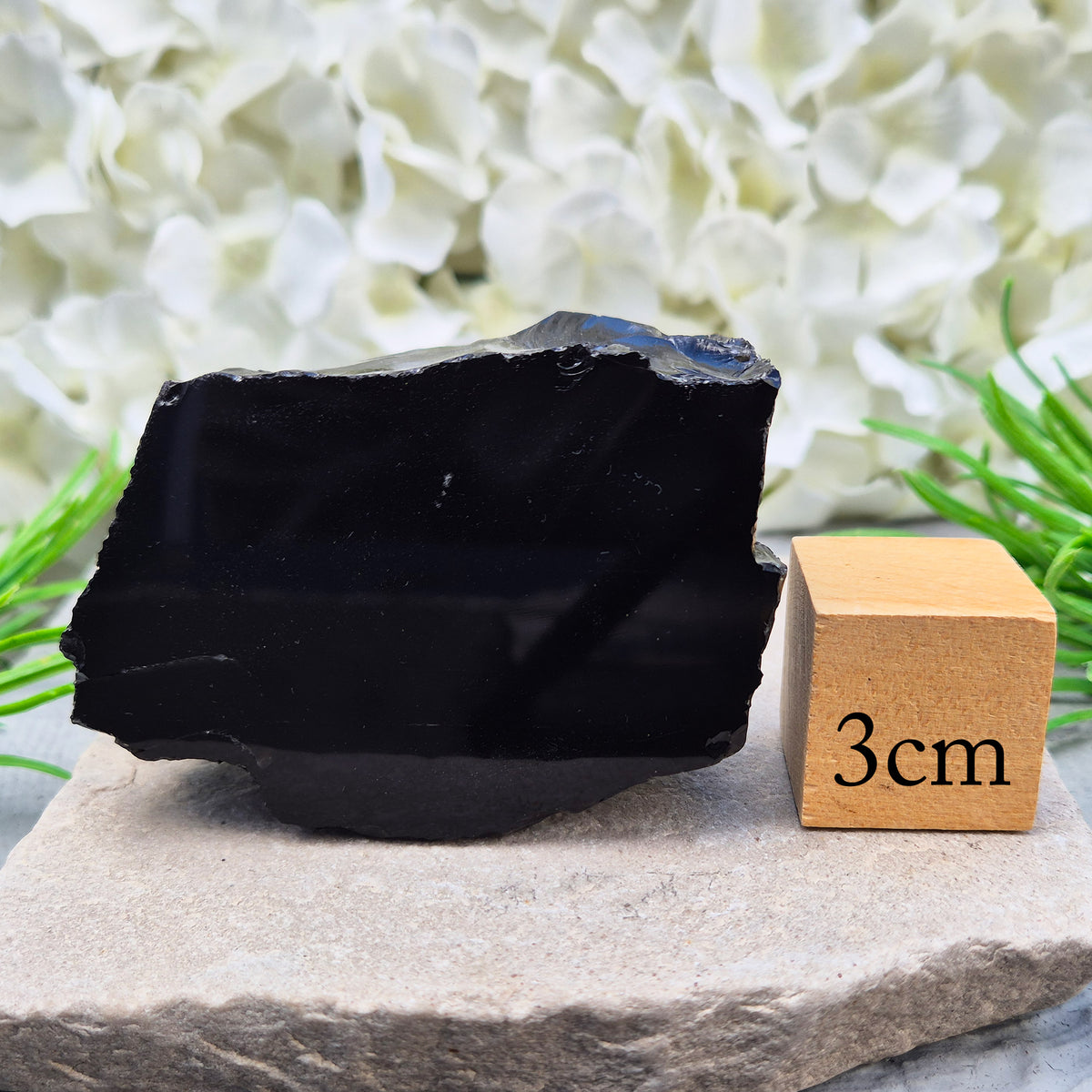 Natural black obsidian freeform from Mexico, known for its grounding presence and protective energy. A striking volcanic glass piece.