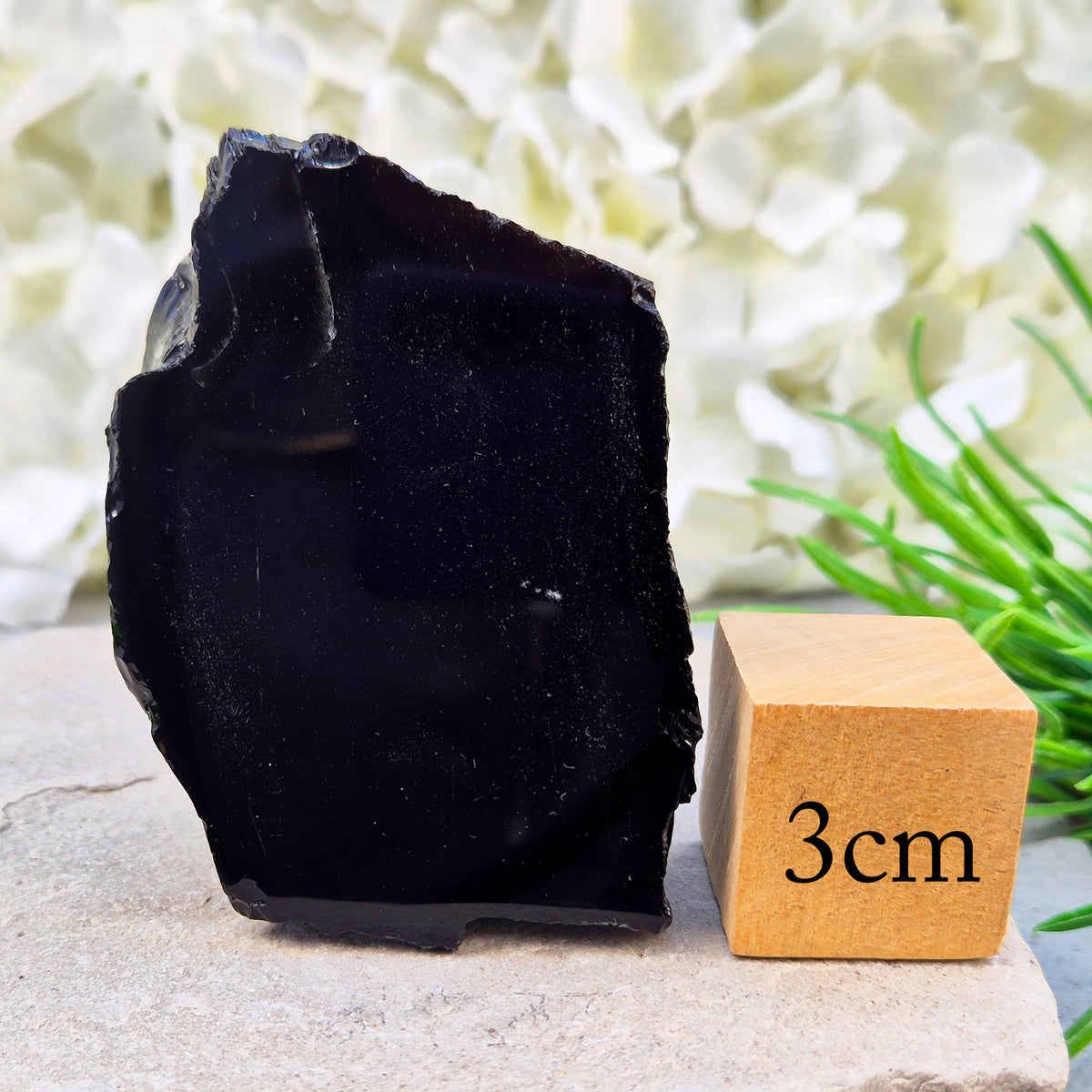 Natural black obsidian freeform from Mexico, known for its grounding presence and protective energy. A striking volcanic glass piece.