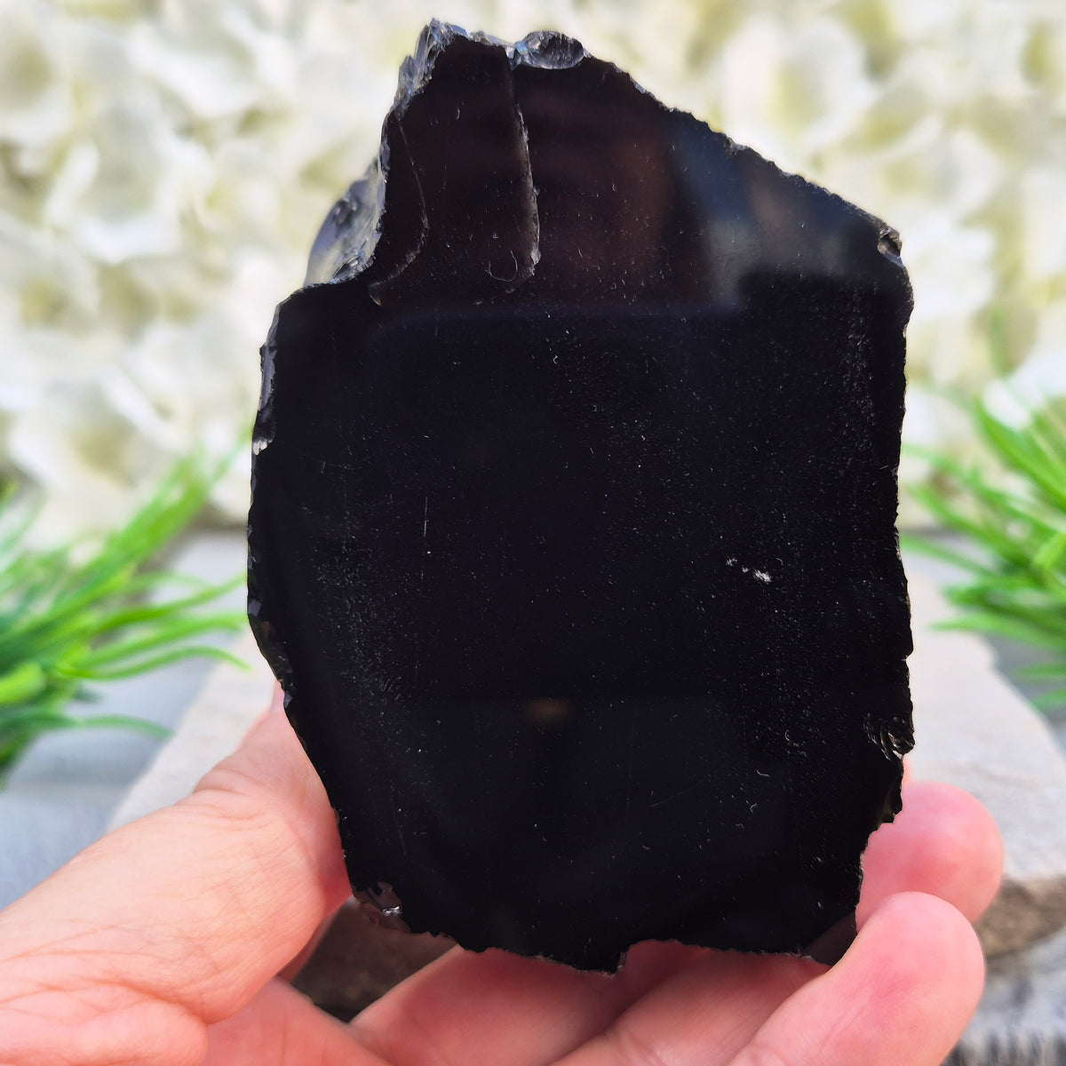 Natural black obsidian freeform from Mexico, known for its grounding presence and protective energy. A striking volcanic glass piece.