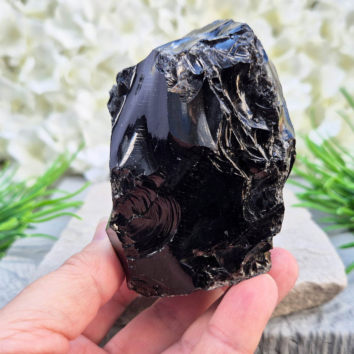 Natural black obsidian freeform from Mexico, known for its grounding presence and protective energy. A striking volcanic glass piece.