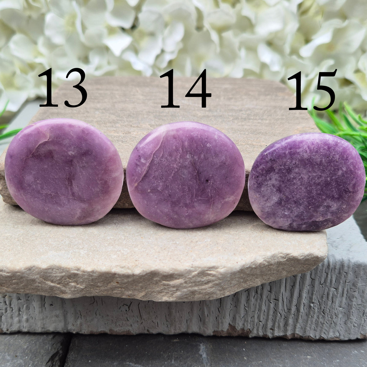 Lepidolite palm stone with calming, balancing energy. Known for easing stress and emotional overwhelm. Smooth, soothing, and ideal for daily support.