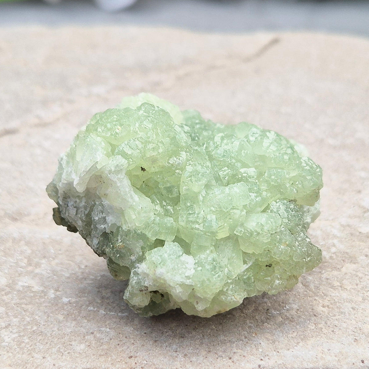 Natural Prehnite cluster with soft green tones and calming energy. A soothing crystal for emotional balance, rest, and peaceful spaces.