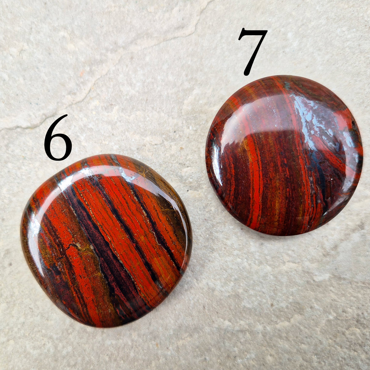 Composite Mugglestone palm stone combining Tiger Eye, Hematite & Red Jasper. Grounding, protective energy supporting focus, strength, and balance.