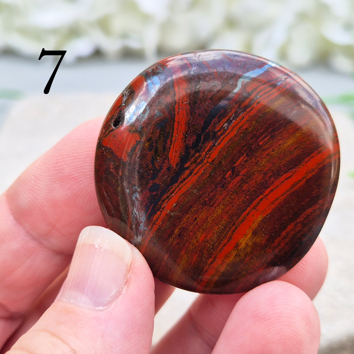 Composite Mugglestone palm stone combining Tiger Eye, Hematite & Red Jasper. Grounding, protective energy supporting focus, strength, and balance.