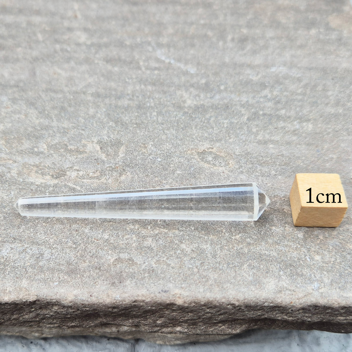 Mini 12-sided quartz wand, Vogel-style double terminated point from Brazil. Known for focus, clarity and directing energy in meditation or energy work.