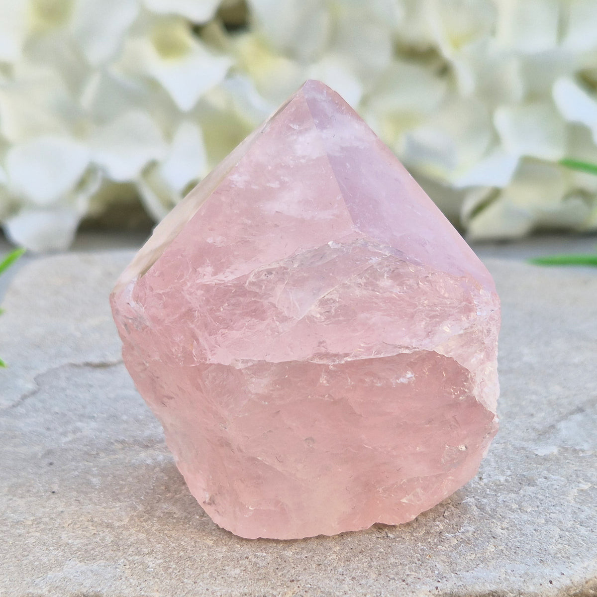 Pink Rose Quartz standing point from Brazil. Promotes self-love, calm, and emotional healing. Perfect for display, meditation, or heart chakra work.