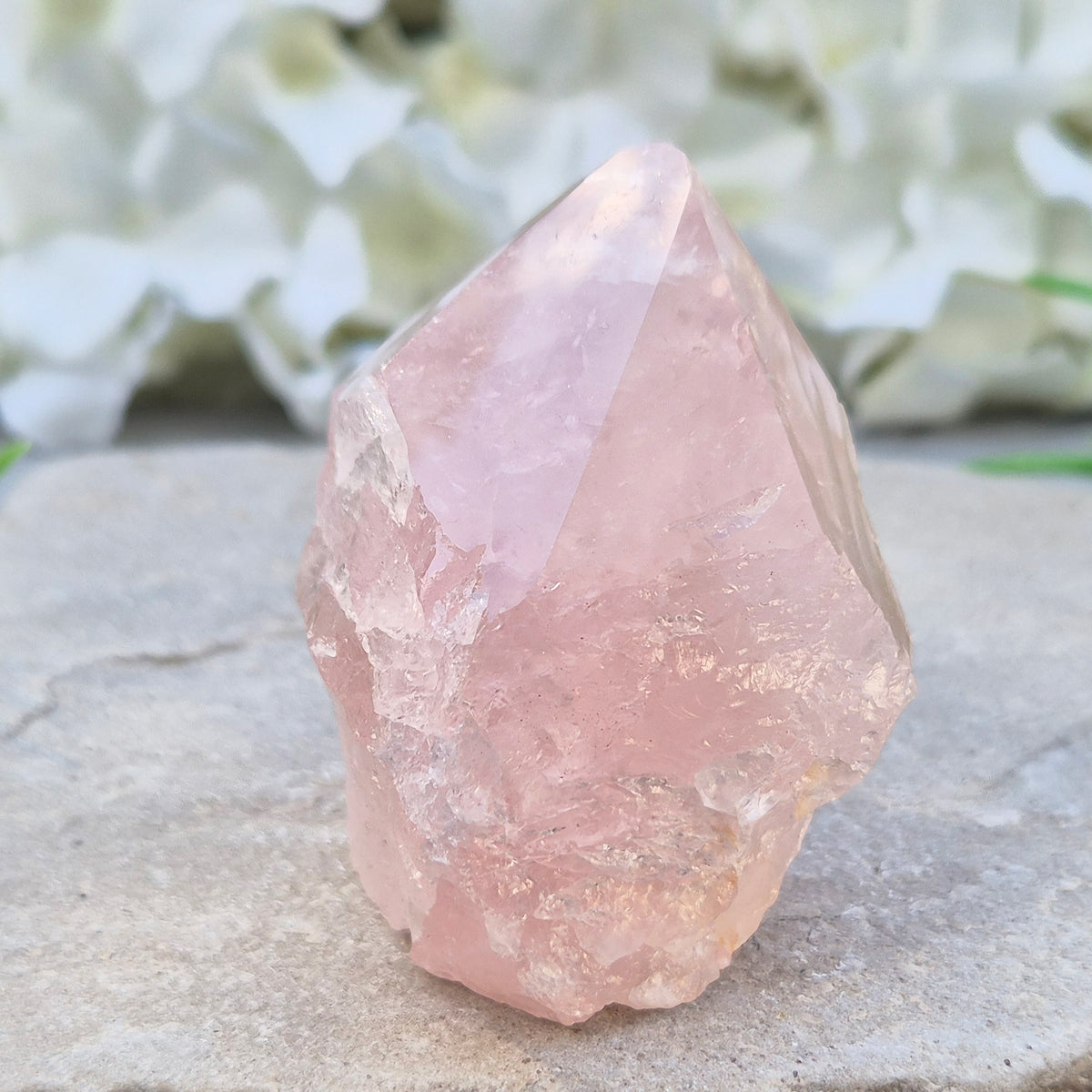 Pink Rose Quartz standing point from Brazil. Promotes self-love, calm, and emotional healing. Perfect for display, meditation, or heart chakra work.