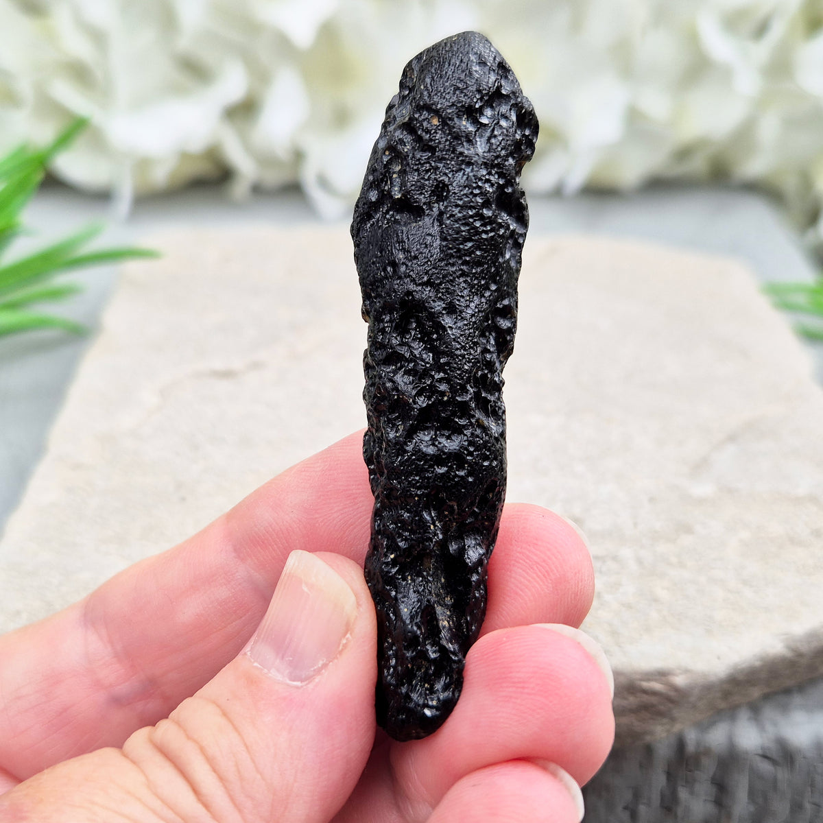 Natural Black Tektite to strengthen grounding, release blockages, and support personal growth. Ideal for energy work and transformation.