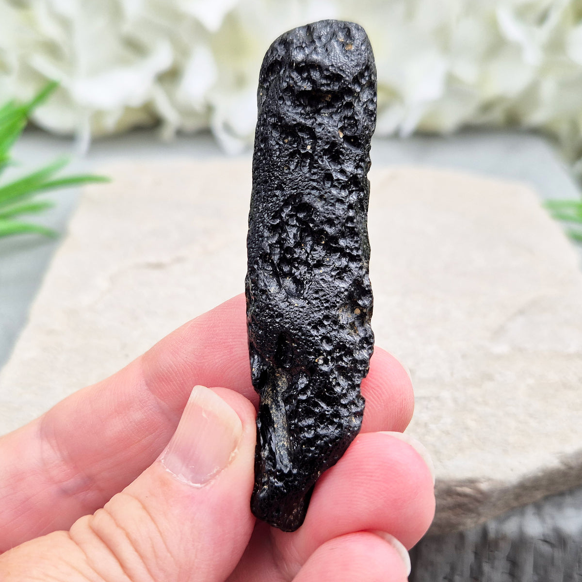 Natural Black Tektite to strengthen grounding, release blockages, and support personal growth. Ideal for energy work and transformation.