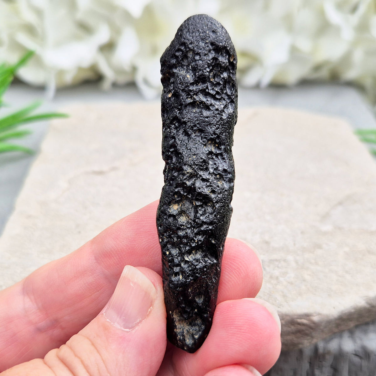 Natural Black Tektite to strengthen grounding, release blockages, and support personal growth. Ideal for energy work and transformation.