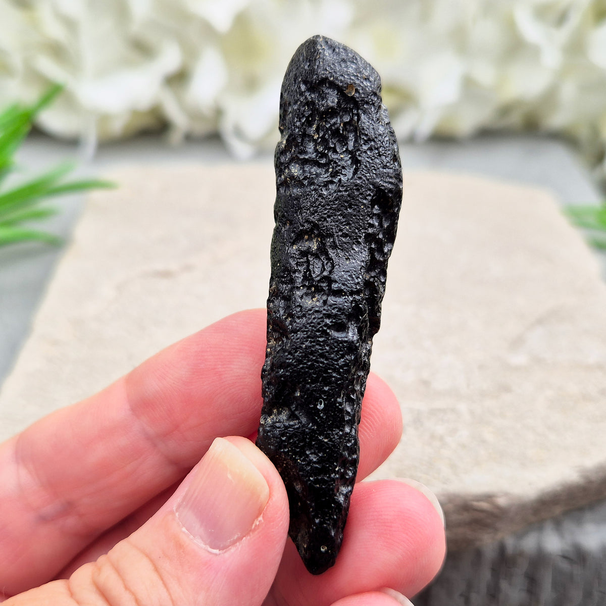 Natural Black Tektite to strengthen grounding, release blockages, and support personal growth. Ideal for energy work and transformation.