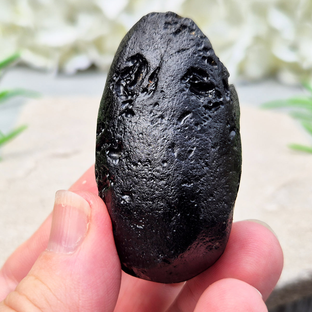 Natural Black Tektite to strengthen grounding, release blockages, and support personal growth. Ideal for energy work and transformation.