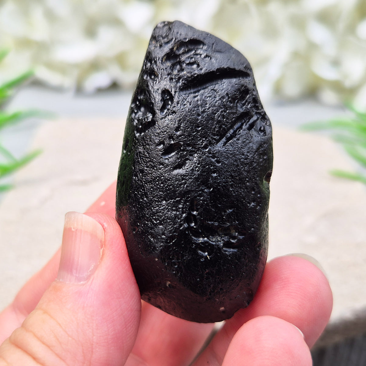 Natural Black Tektite to strengthen grounding, release blockages, and support personal growth. Ideal for energy work and transformation.