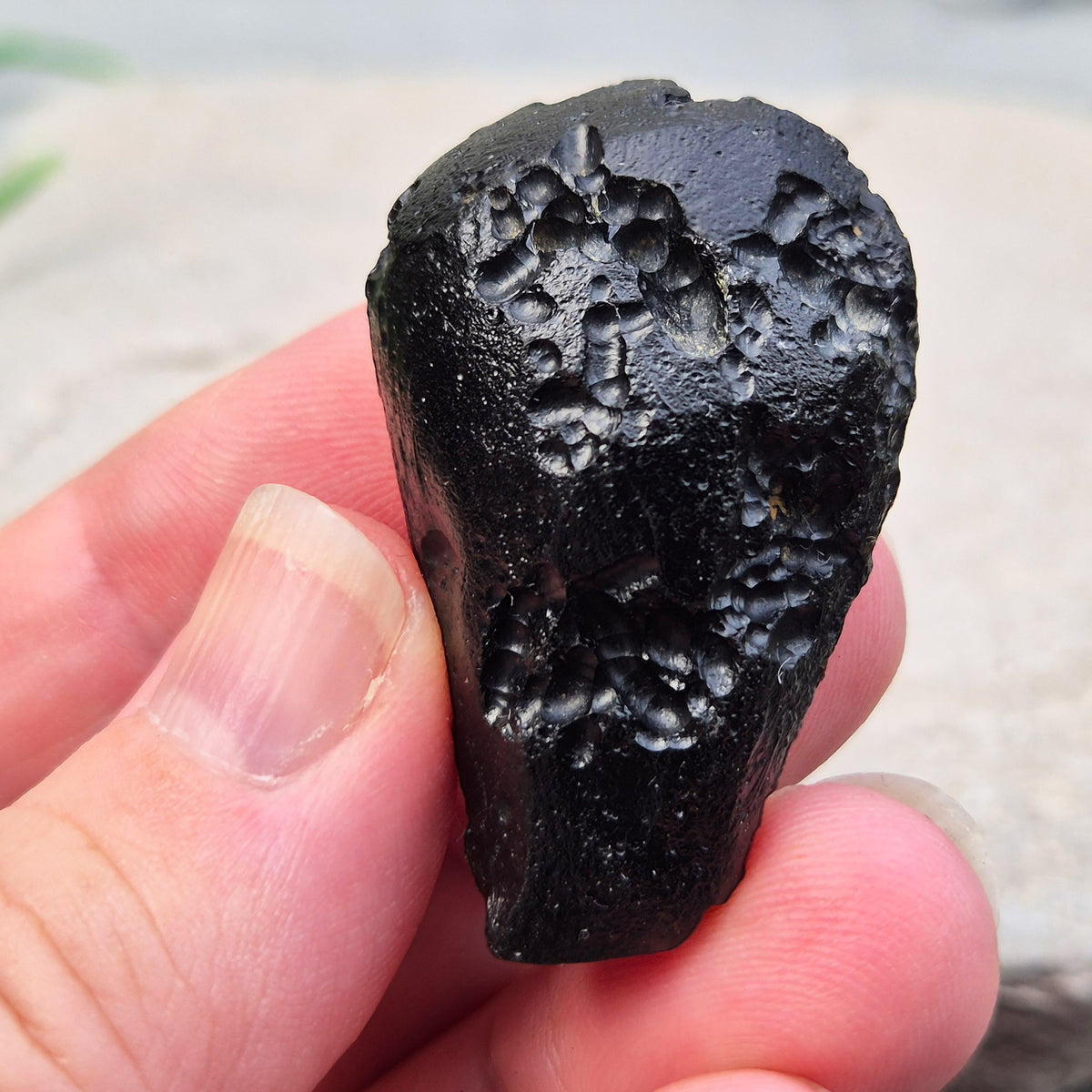 Natural Black Tektite to strengthen grounding, release blockages, and support personal growth. Ideal for energy work and transformation.