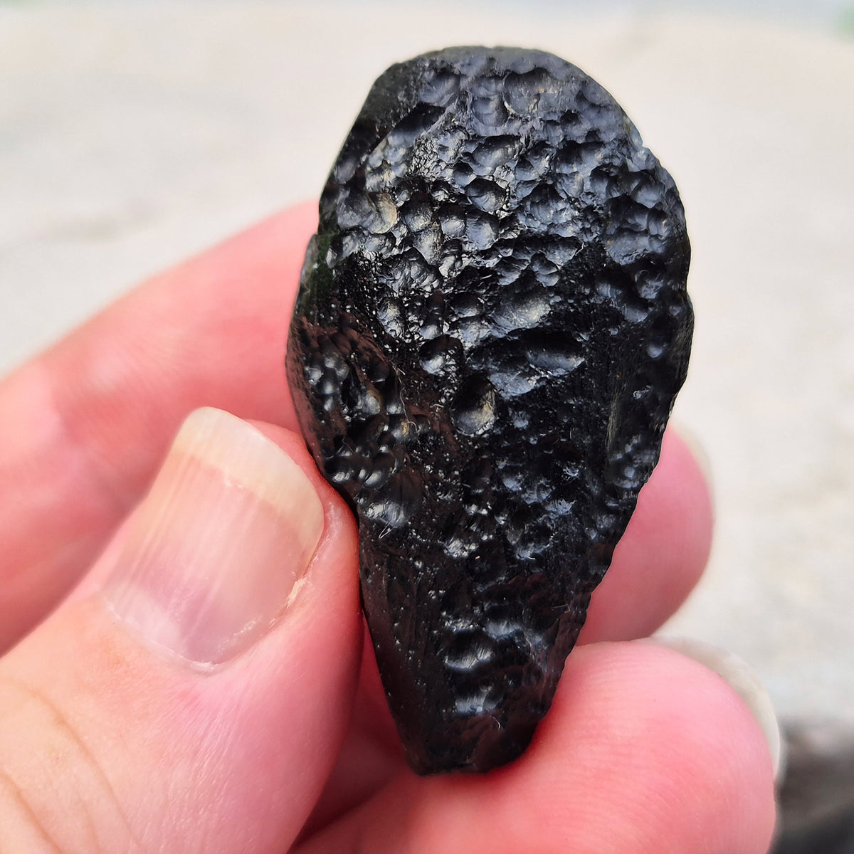 Natural Black Tektite to strengthen grounding, release blockages, and support personal growth. Ideal for energy work and transformation.