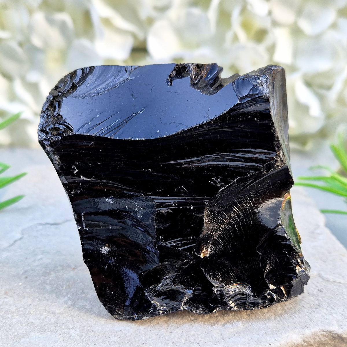 Natural black obsidian freeform from Mexico, known for its grounding presence and protective energy. A striking volcanic glass piece.