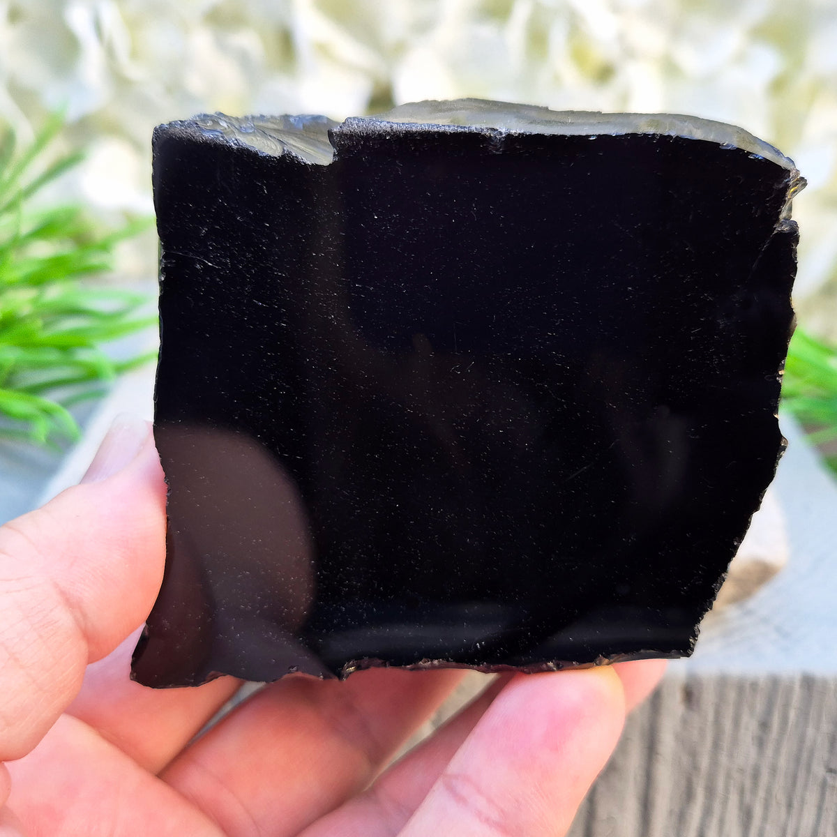 Natural black obsidian freeform from Mexico, known for its grounding presence and protective energy. A striking volcanic glass piece.