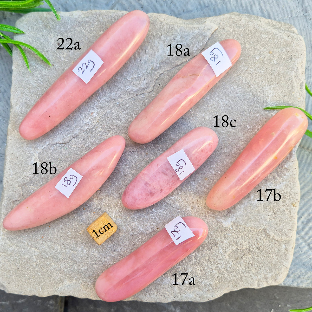 Shop a polished Pink Opal wand in soft, milky pink. Often associated with gentle heart energy and emotional comfort. 