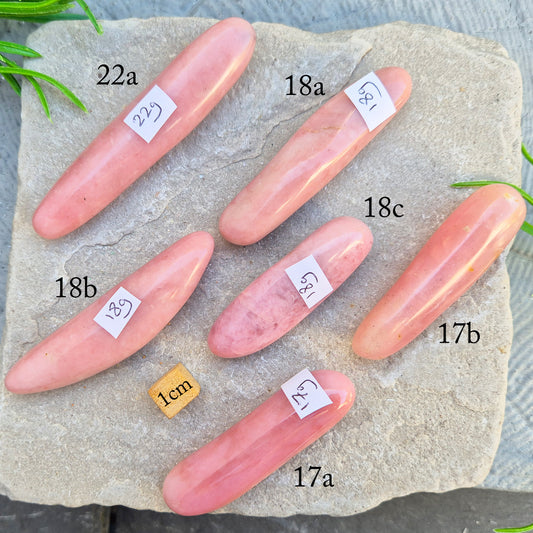 Shop a polished Pink Opal wand in soft, milky pink. Often associated with gentle heart energy and emotional comfort. 