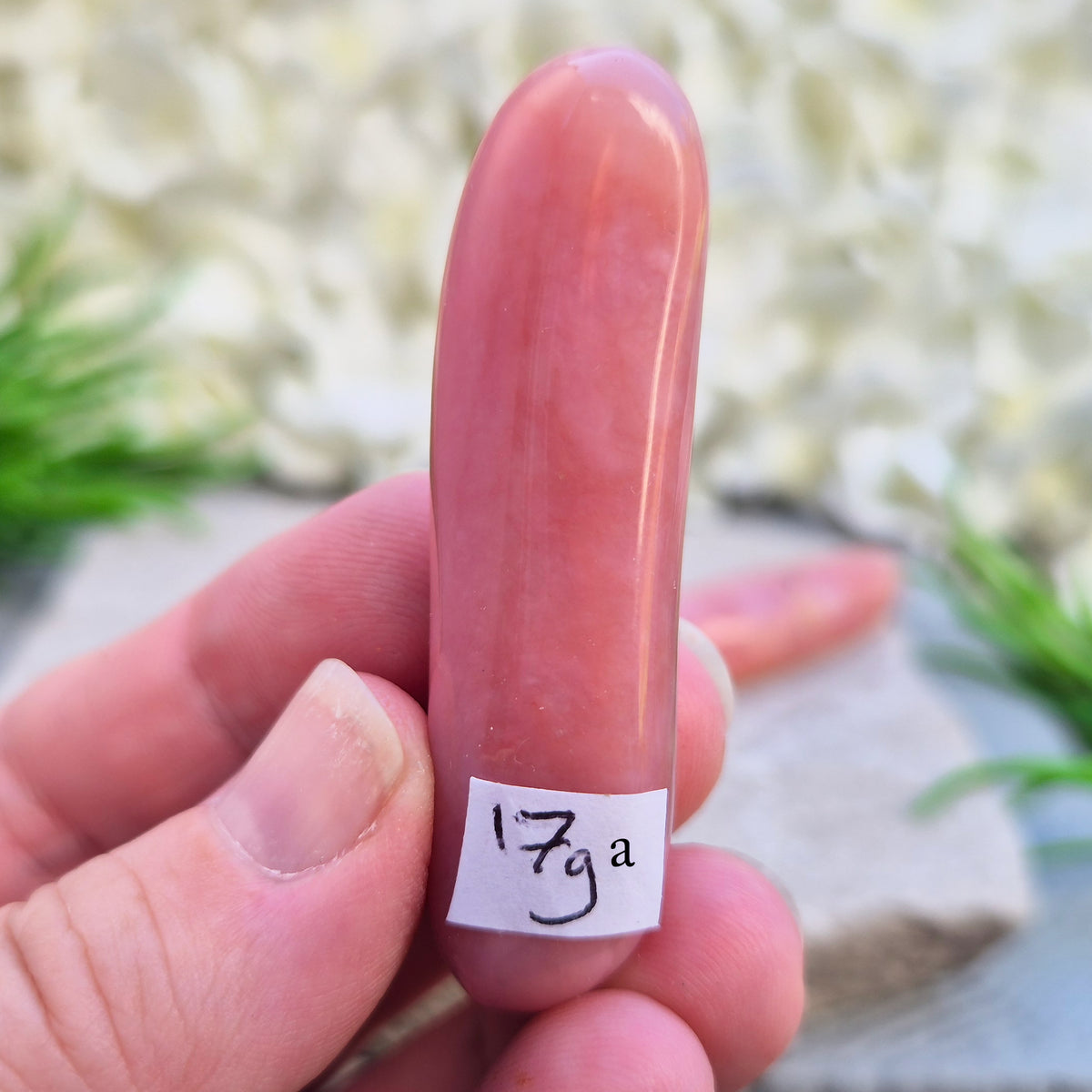 Shop a polished Pink Opal wand in soft, milky pink. Often associated with gentle heart energy and emotional comfort. 