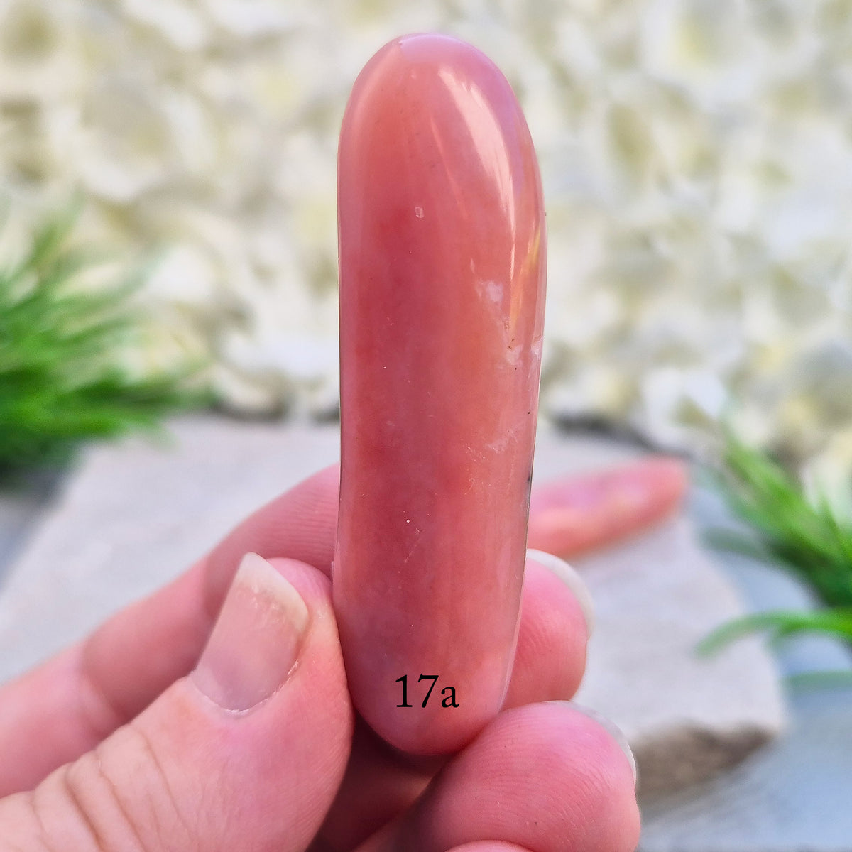 Shop a polished Pink Opal wand in soft, milky pink. Often associated with gentle heart energy and emotional comfort. 