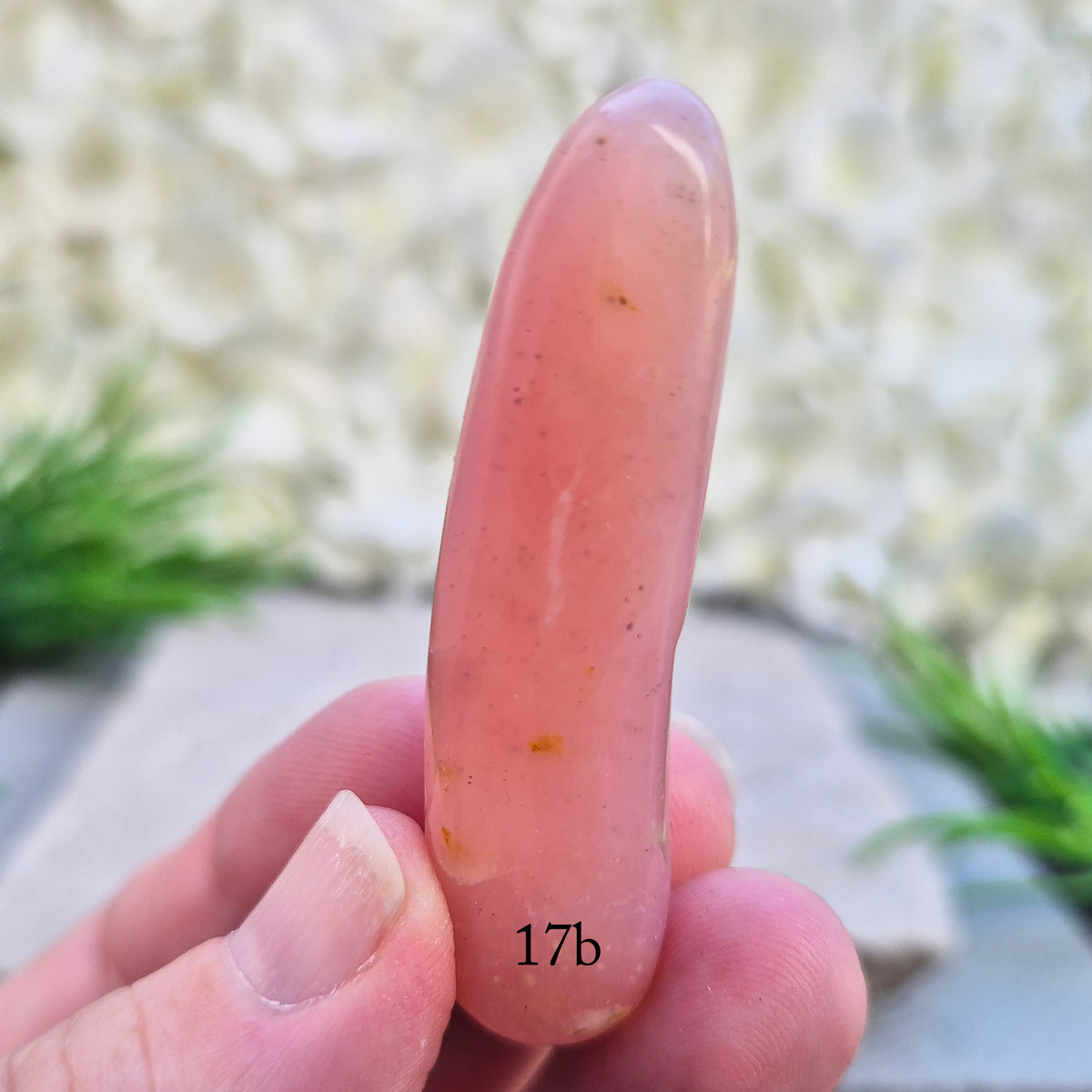 Shop a polished Pink Opal wand in soft, milky pink. Often associated with gentle heart energy and emotional comfort. 