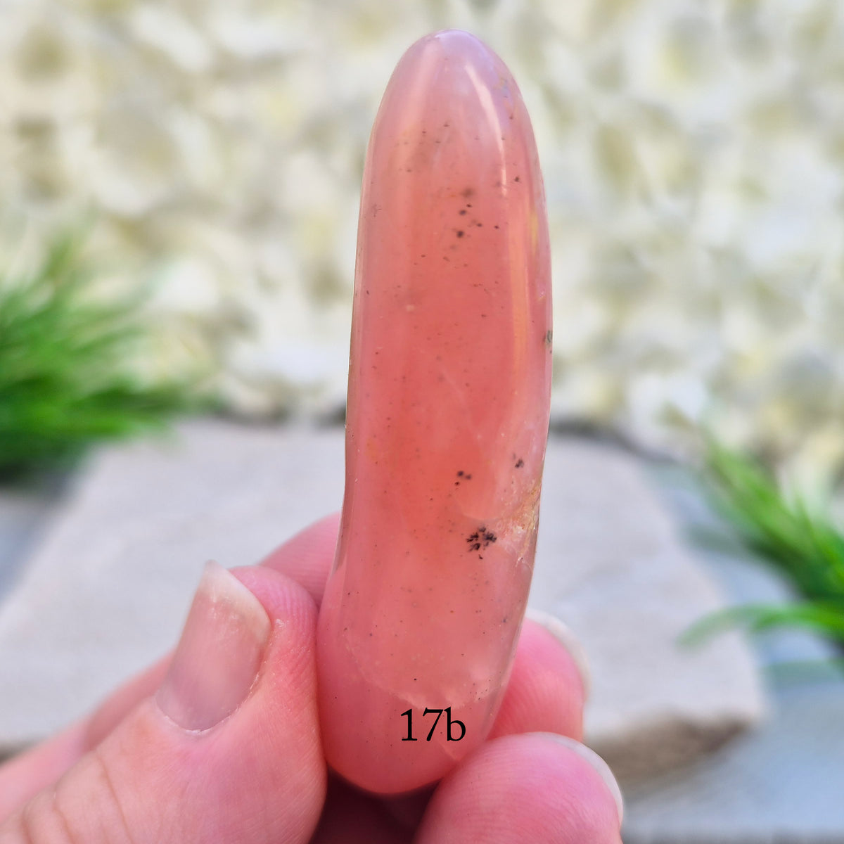 Shop a polished Pink Opal wand in soft, milky pink. Often associated with gentle heart energy and emotional comfort. 