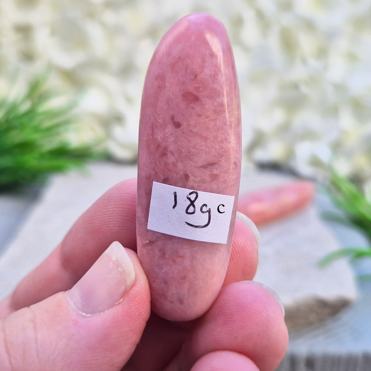Shop a polished Pink Opal wand in soft, milky pink. Often associated with gentle heart energy and emotional comfort. 