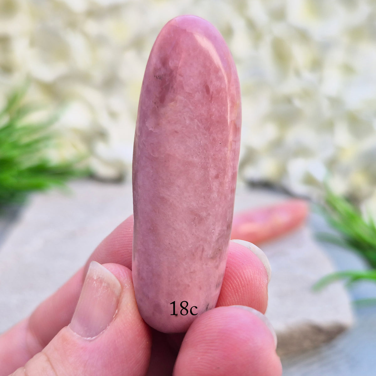 Shop a polished Pink Opal wand in soft, milky pink. Often associated with gentle heart energy and emotional comfort. 