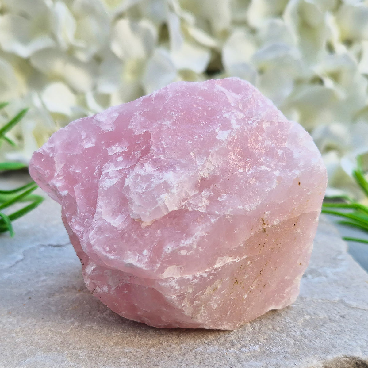 Natural Rose Quartz crystal to display in your home. Promotes calm, self-love, and emotional balance while bringing harmony to your space. 