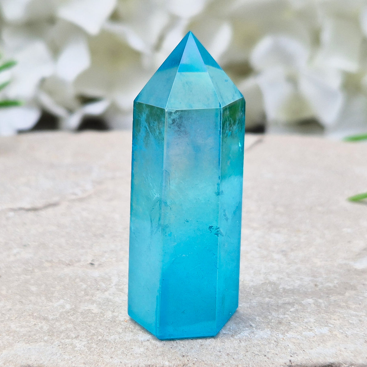 Striking Aqua Aura Point from Brazil. Gold-bonded Quartz for clarity, calm, and communication. High-vibe crystal to uplift and soothe the aura. 