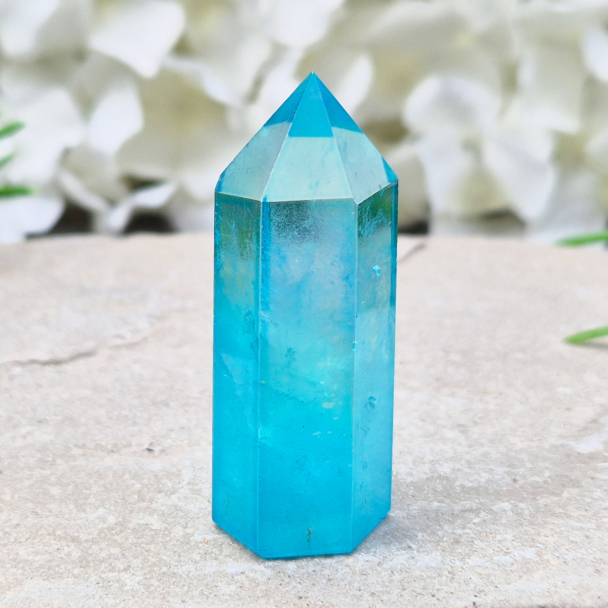 Striking Aqua Aura Point from Brazil. Gold-bonded Quartz for clarity, calm, and communication. High-vibe crystal to uplift and soothe the aura. 