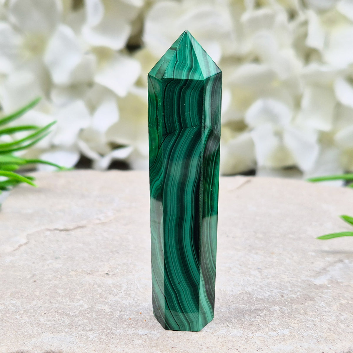 Beautiful Malachite Tower featuring natural patterns and vibrant green tones. Ideal for crystal lovers, meditation, and boho home décor.