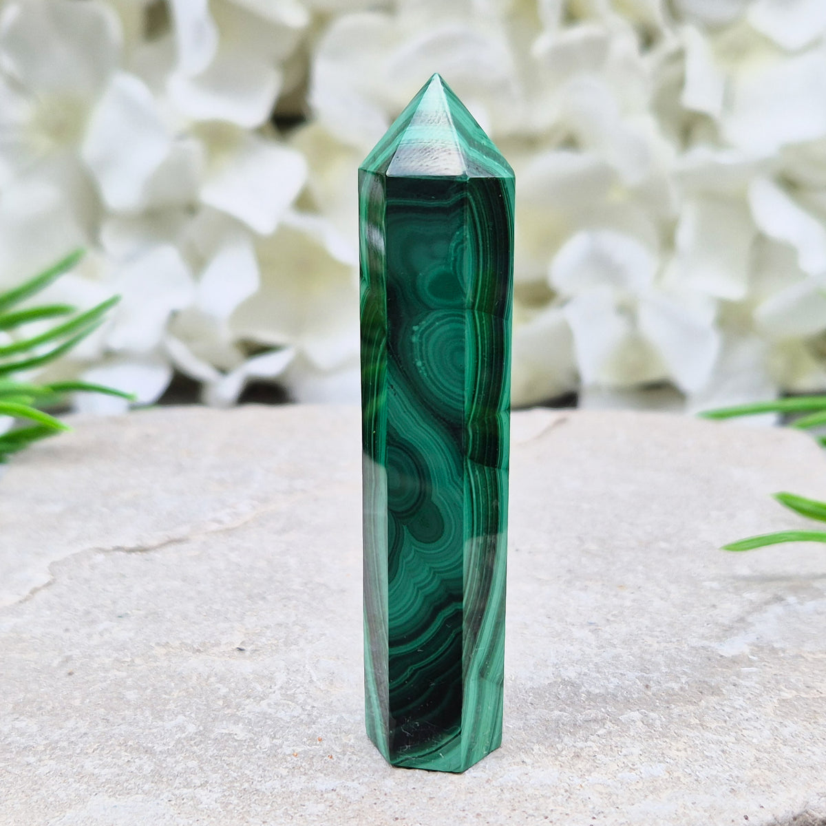 Beautiful Malachite Tower featuring natural patterns and vibrant green tones. Ideal for crystal lovers, meditation, and boho home décor.