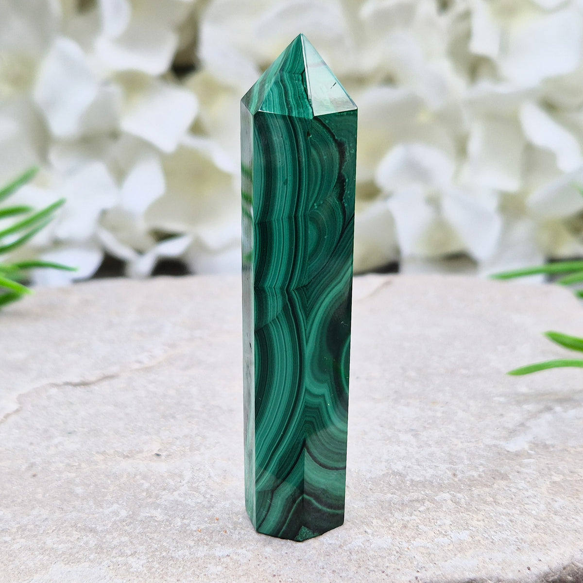 Beautiful Malachite Tower featuring natural patterns and vibrant green tones. Ideal for crystal lovers, meditation, and boho home décor.