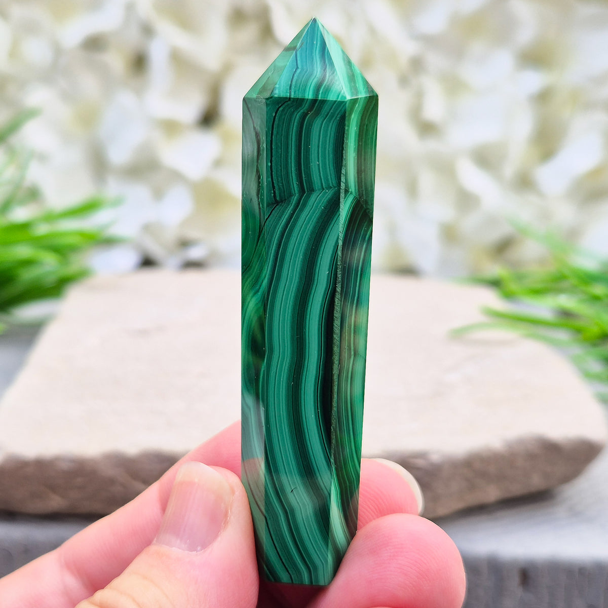 Beautiful Malachite Tower featuring natural patterns and vibrant green tones. Ideal for crystal lovers, meditation, and boho home décor.