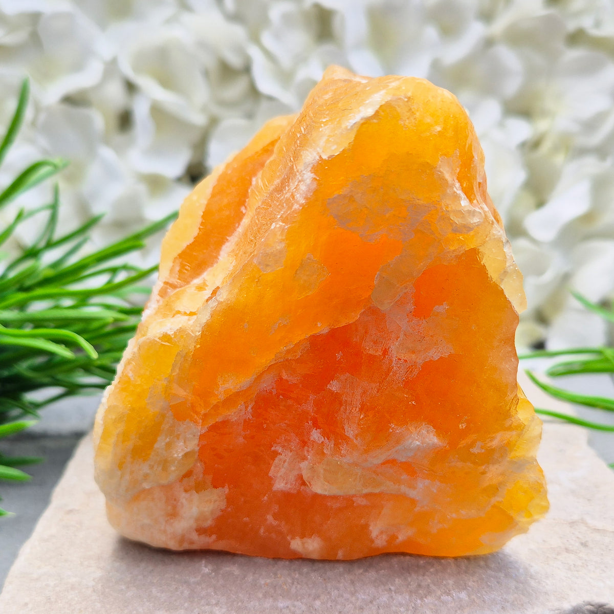 Natural Orange Calcite standing stone from Mexico. A warm, uplifting crystal for motivation, confidence, and brighter, more energised spaces.