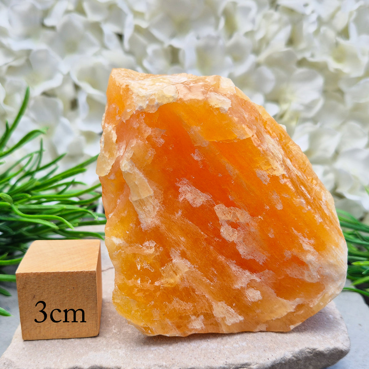 Natural Orange Calcite standing stone from Mexico. A warm, uplifting crystal for motivation, confidence, and brighter, more energised spaces.