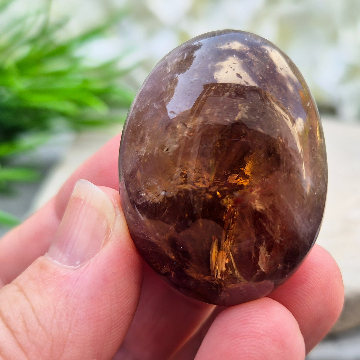 Ametrine polished palm stone with soft purple and golden tones. A natural blend of Amethyst and Citrine with a balanced, easy feel.