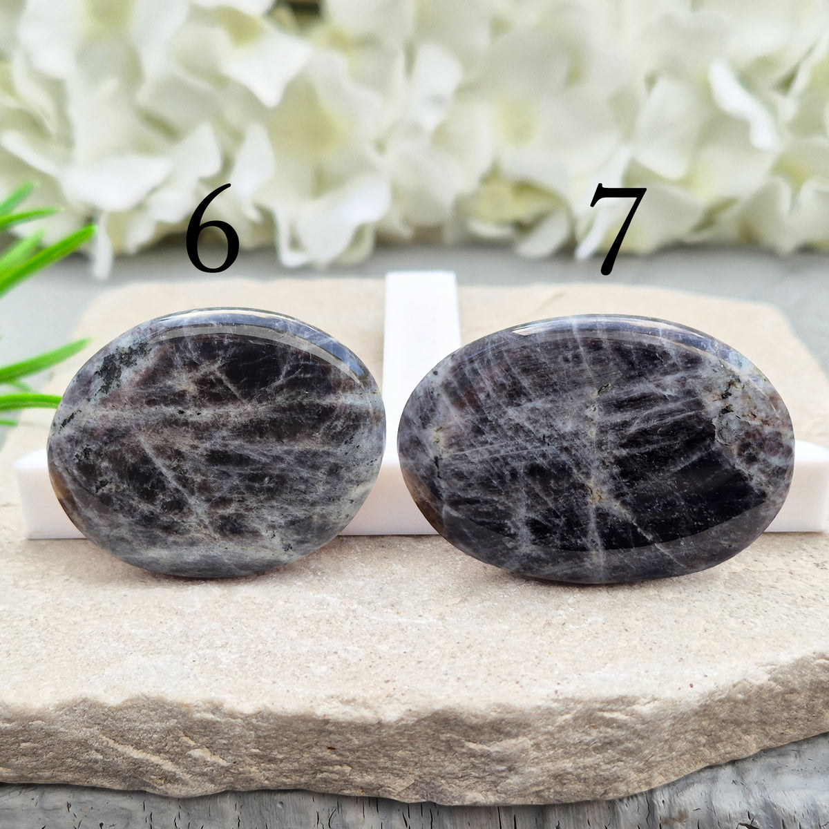 Black Moonstone Palm Stone, valued for its connection to the moon’s energy. Perfect for enhancing intuition, emotional healing, and balancing energy.