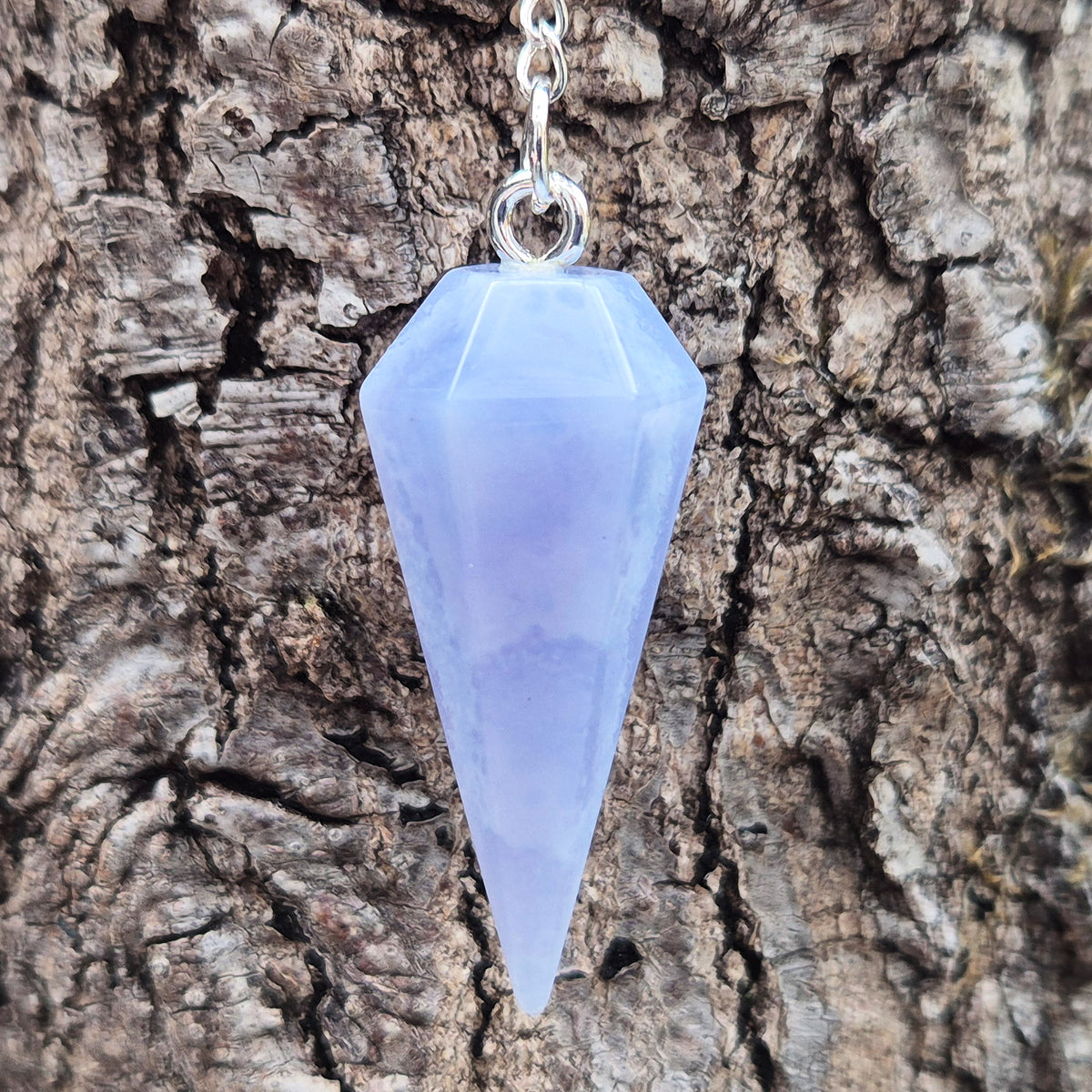 Blue Lace Agate crystal pendulum, known for its calming energy. Ideal for dowsing, spiritual guidance, and bringing a steady, peaceful feel.
