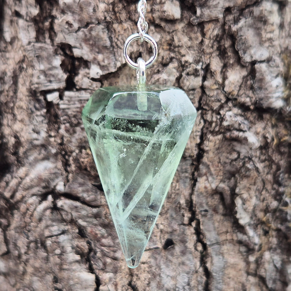 Hand-picked green fluorite crystal pendulum for dowsing, meditation and intuitive questions. Often reached for when you want a clearer, calmer head.