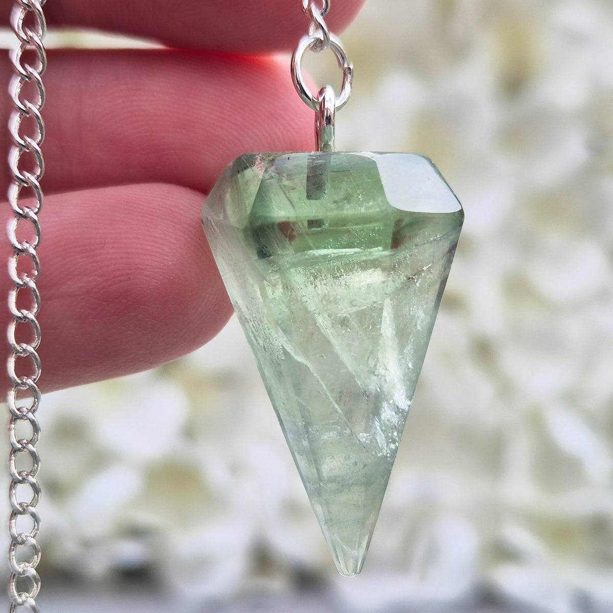 Hand-picked green fluorite crystal pendulum for dowsing, meditation and intuitive questions. Often reached for when you want a clearer, calmer head.