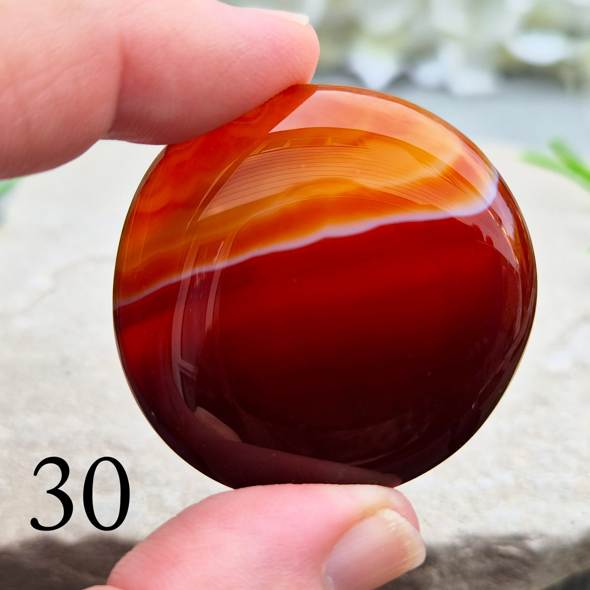 Banded Carnelian palm stone that is said to help Boost motivation, confidence and creativity. Grounding Root and Sacral crystal for energy and focus.