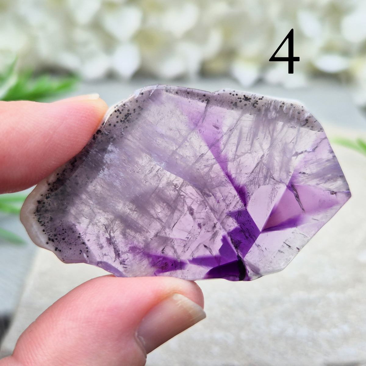 One-of-a-kind Vortex Amethyst slices with a natural trapiche-like radial pattern. Polished amethyst with unique internal colour zoning. Collectors crystal.