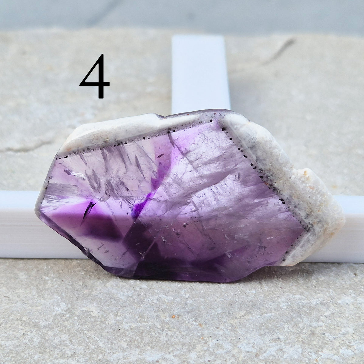 One-of-a-kind Vortex Amethyst slices with a natural trapiche-like radial pattern. Polished amethyst with unique internal colour zoning. Collectors crystal.