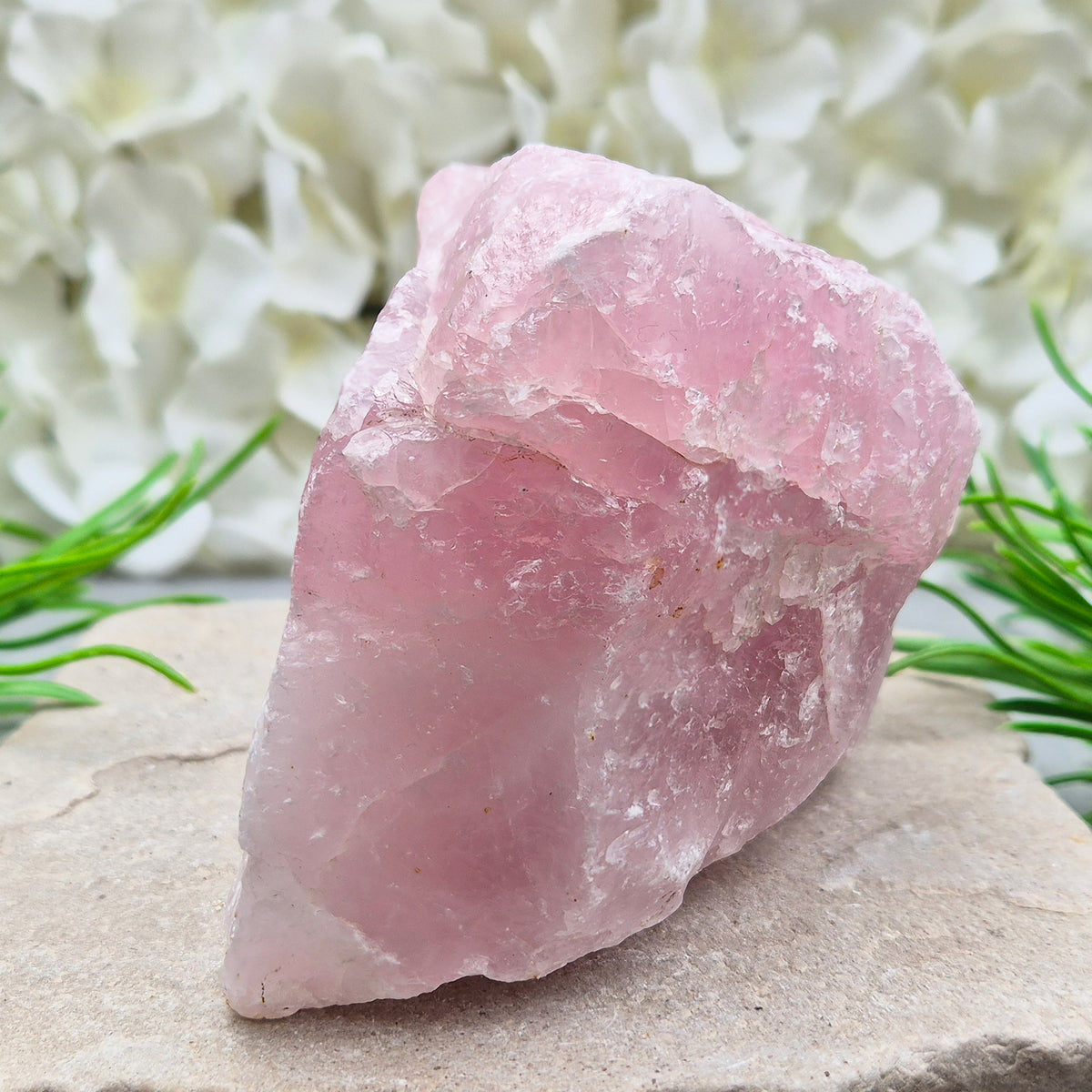 Natural Rose Quartz crystal to display in your home. Promotes calm, self-love, and emotional balance while bringing harmony to your space.