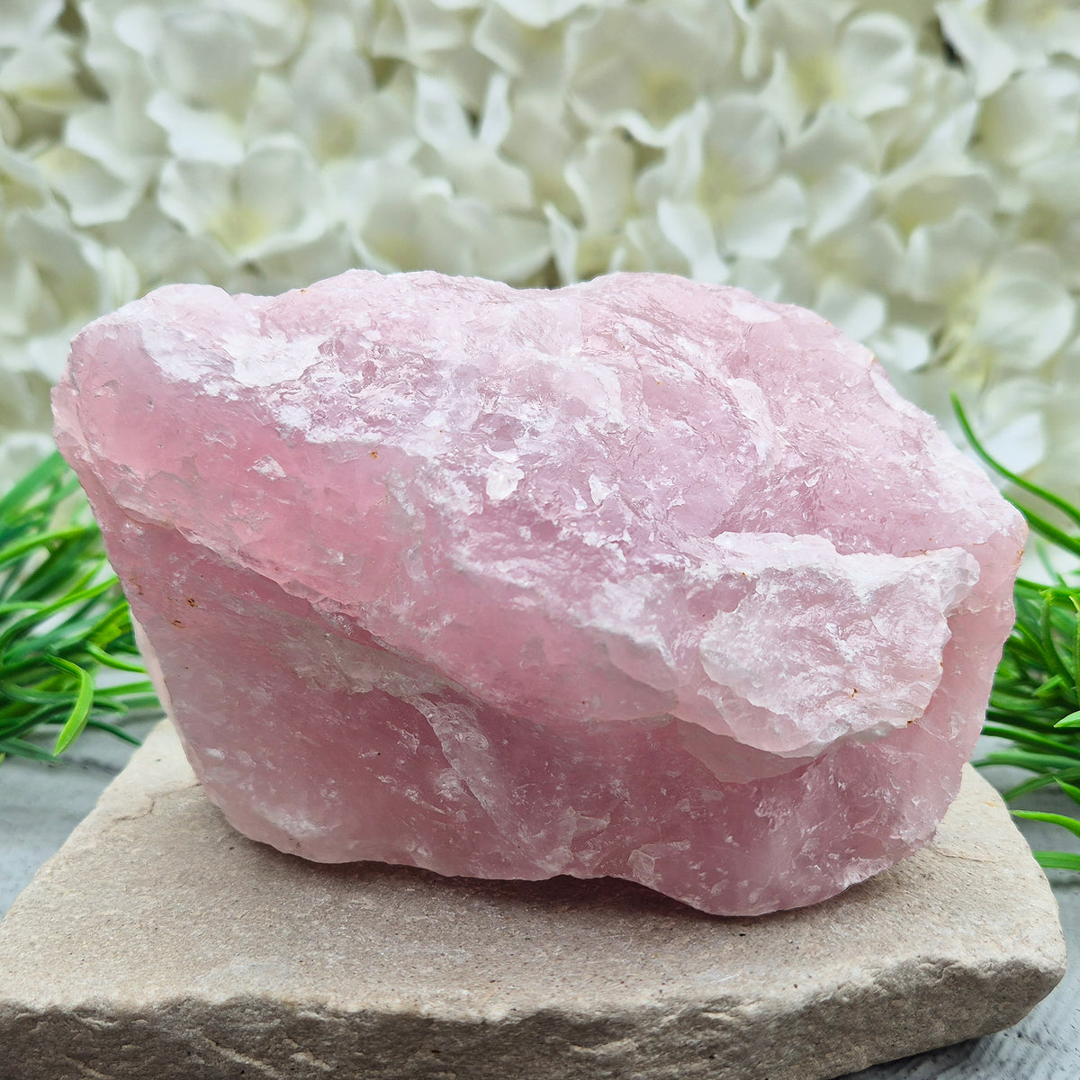 Natural Rose Quartz crystal to display in your home. Promotes calm, self-love, and emotional balance while bringing harmony to your space.